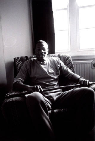 Justin Fashanu in his basement flat in Regency Square, Brighton, taken in 1986 by Kevin Weaver.